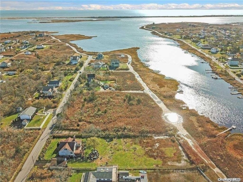 Great Opportunity to own this 4 bedroom home located along - Beach Home for sale in Mastic Beach, New York on Beachhouse.com