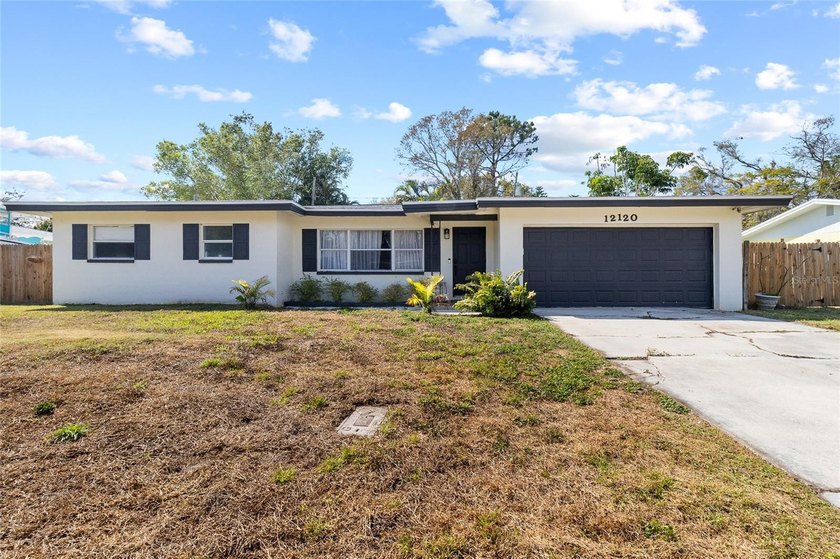 New Price! This beautifully updated 3-bedroom, 2-bath, 2-car - Beach Home for sale in Largo, Florida on Beachhouse.com