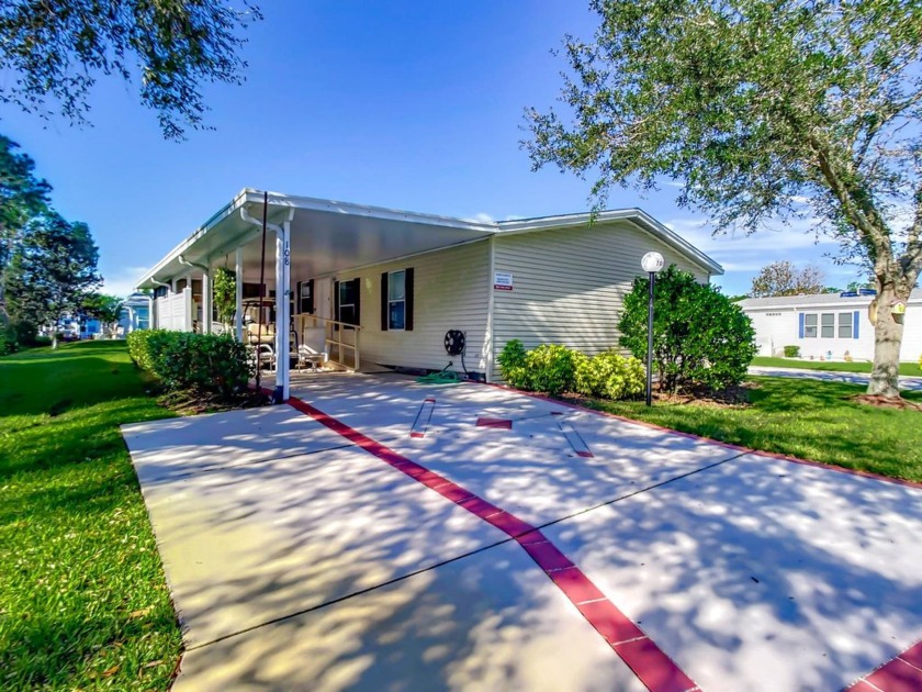 This 2004 Homes of Merit has 2-bedrooms and 2-full baths, with - Beach Home for sale in Ormond Beach, Florida on Beachhouse.com