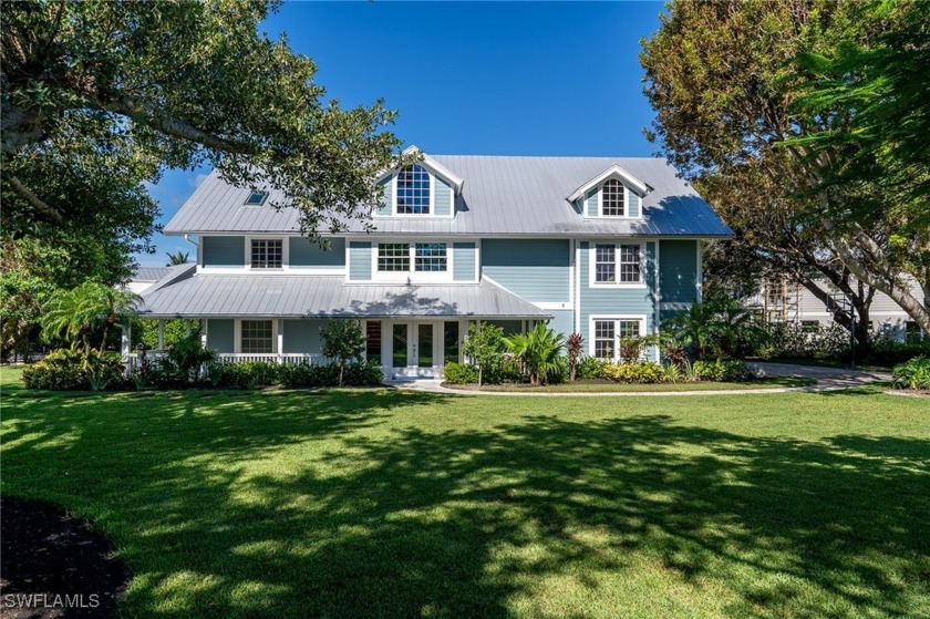 A masterpiece of design and craftsmanship awaits in this - Beach Home for sale in Sanibel, Florida on Beachhouse.com