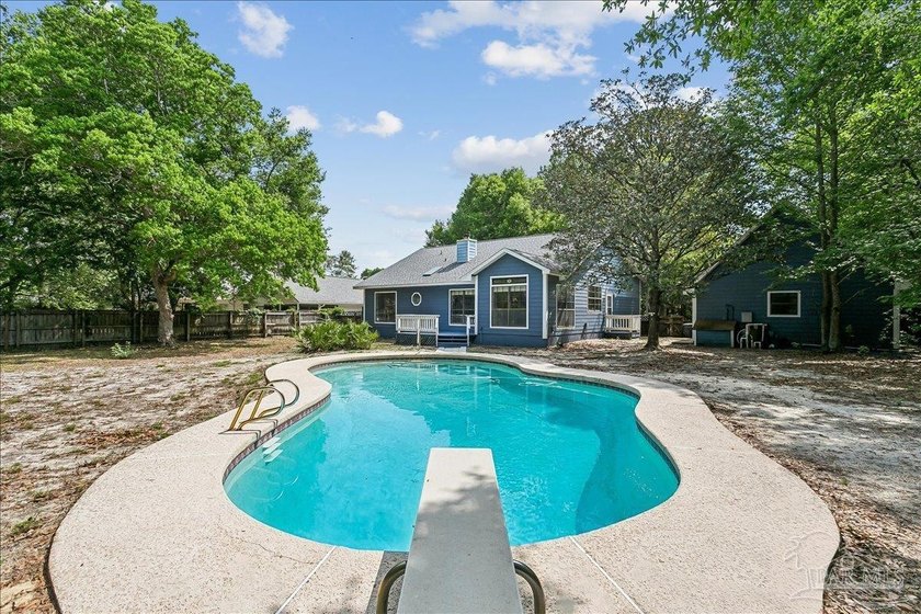 Tucked away on a quiet cul-de-sac in the established Bay Woods - Beach Home for sale in Gulf Breeze, Florida on Beachhouse.com