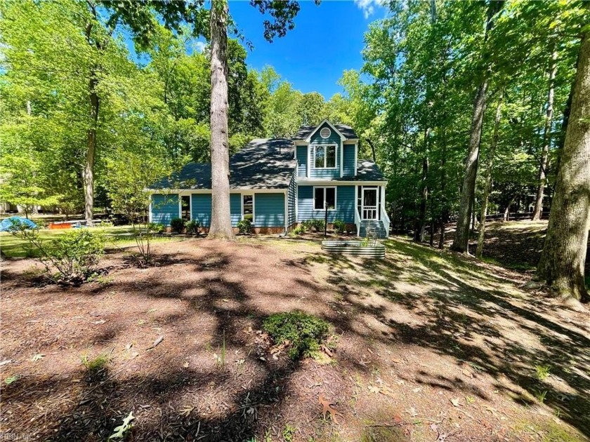 Tucked at the end of a quiet cul-de-sac, this beautifully - Beach Home for sale in Smithfield, Virginia on Beachhouse.com