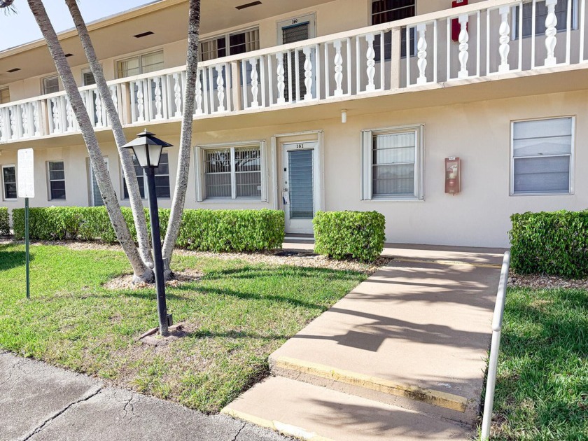 Welcome to this charming, FIRST-FLOOR unit in a centrally - Beach Condo for sale in West Palm Beach, Florida on Beachhouse.com