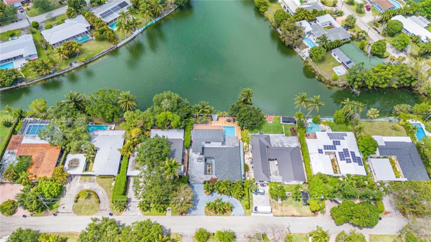 Waterfront 4 bd/3 bath home with heated pool & in-law - Beach Home for sale in South Miami, Florida on Beachhouse.com
