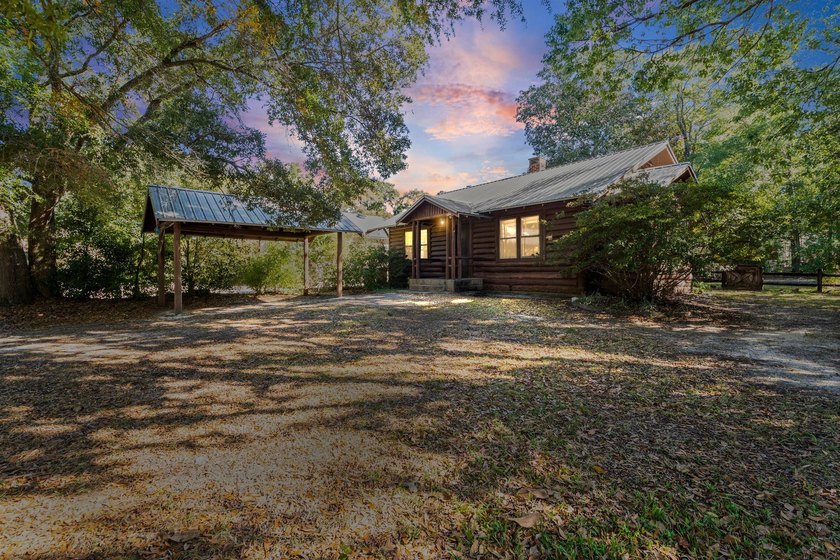 Welcome to *Pine Lodge* - a 1928 historic log cabin in the heart - Beach Home for sale in Fairhope, Alabama on Beachhouse.com
