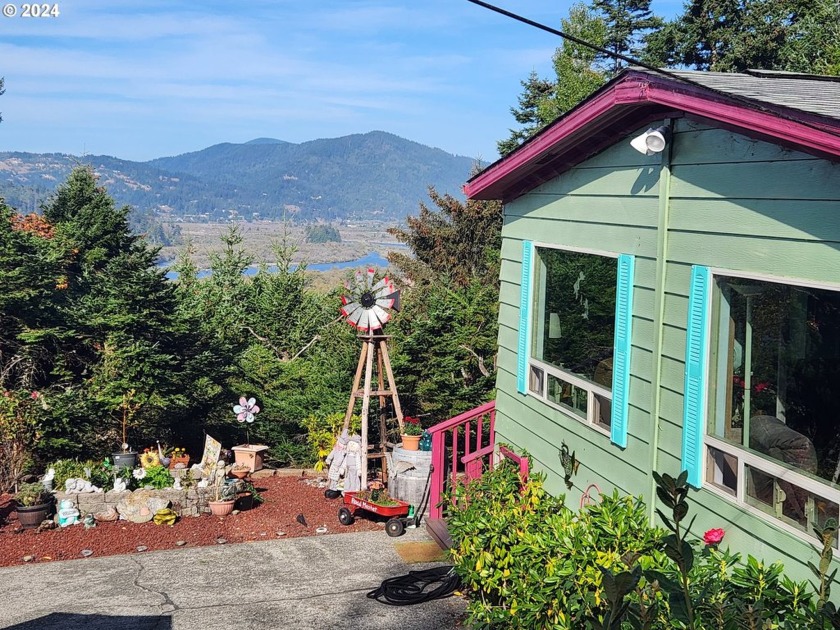 Looking for a charming single-level home with stunning river - Beach Home for sale in Gold Beach, Oregon on Beachhouse.com