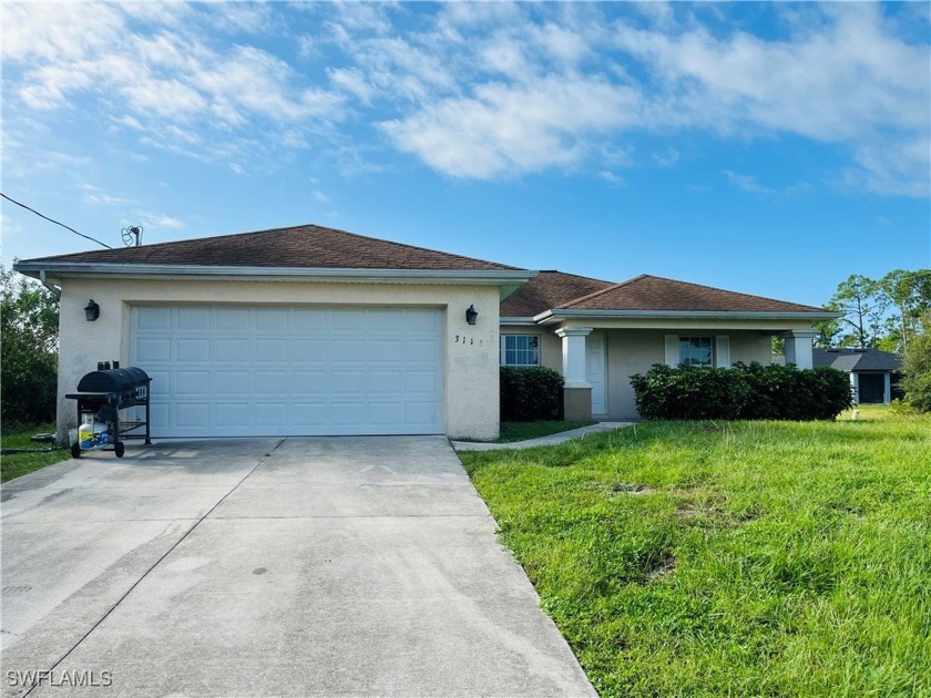 This is a three bedroom two bath split plan.  Open Floor Plan - Beach Home for sale in Lehigh Acres, Florida on Beachhouse.com