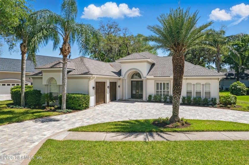 Nestled beneath a canopy of mature oak trees in the gated - Beach Home for sale in Jacksonville, Florida on Beachhouse.com