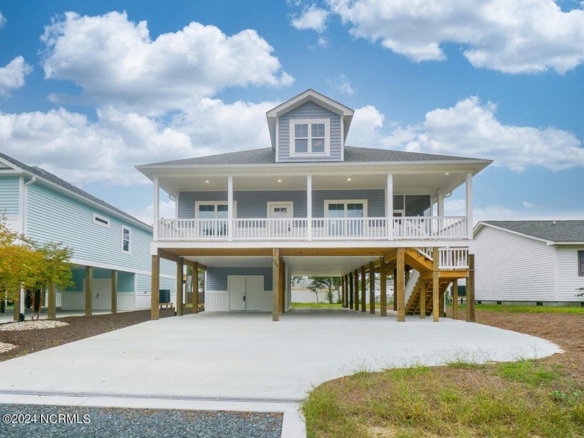 MUST SEA and just completed! Lots of builders are trying to pre - Beach Home for sale in Oak Island, North Carolina on Beachhouse.com