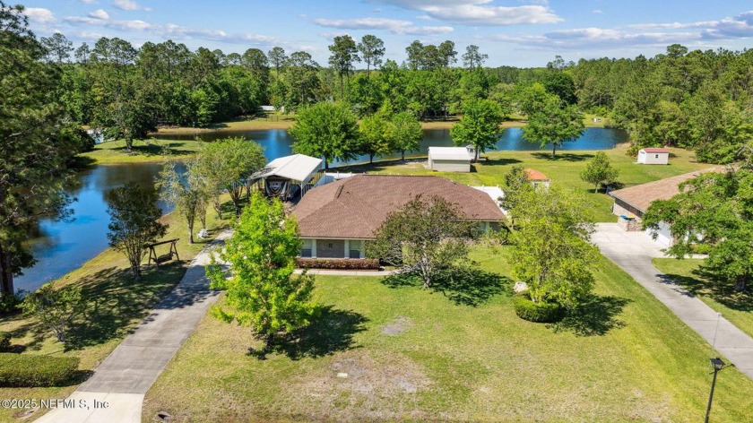 RECENTLY UPDATED BRICK HOME ON THE POND! Must see 3 Bedrooms, 2 - Beach Home for sale in Jacksonville, Florida on Beachhouse.com