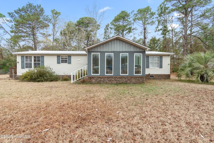 Have you been looking for a place minutes to the beach but still - Beach Home for sale in Shallotte, North Carolina on Beachhouse.com