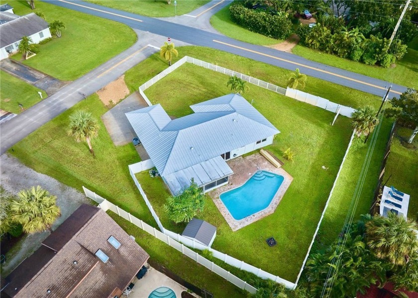 LOVELY 3/2 VERO BEACH POOL HOME on just over 1/3 acre FENCED - Beach Home for sale in Vero Beach, Florida on Beachhouse.com