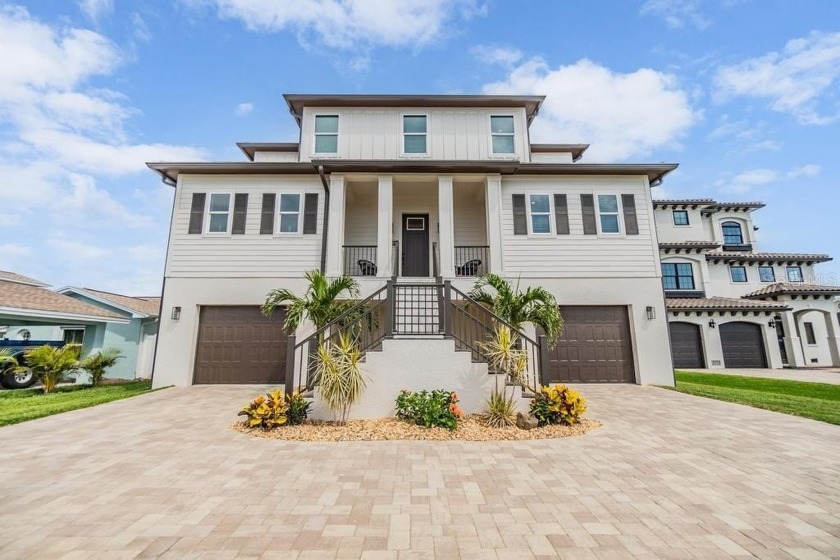Discover the ultimate in coastal living at this exquisite 2,695 - Beach Home for sale in Redington Beach, Florida on Beachhouse.com