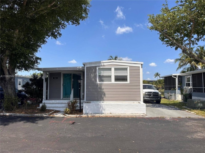 This charming residence features two spacious bedrooms and one - Beach Home for sale in Fort Lauderdale, Florida on Beachhouse.com