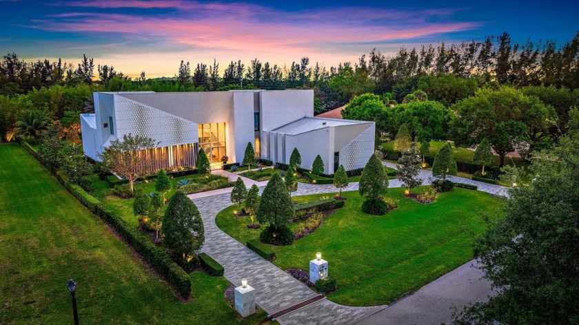 Welcome to this one-of-a-kind modern sanctuary in the heart of - Beach Home for sale in Palm Beach Gardens, Florida on Beachhouse.com