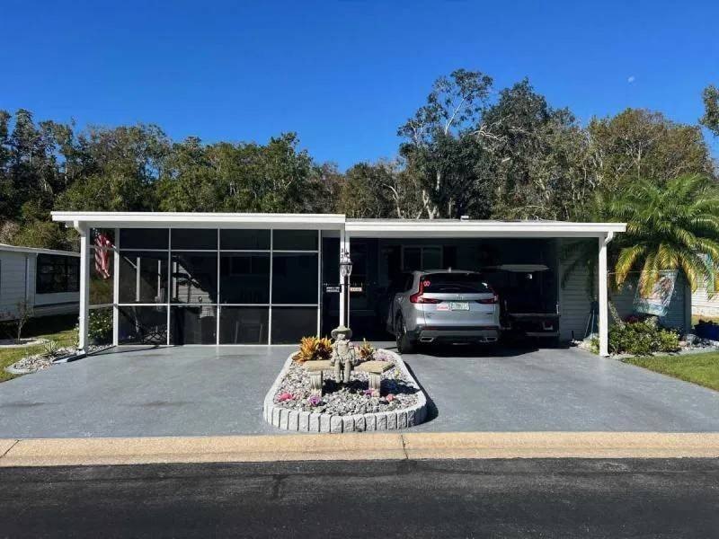 This 2/2 bath triple wide home is located in this beautiful - Beach Home for sale in Spring Hill, Florida on Beachhouse.com