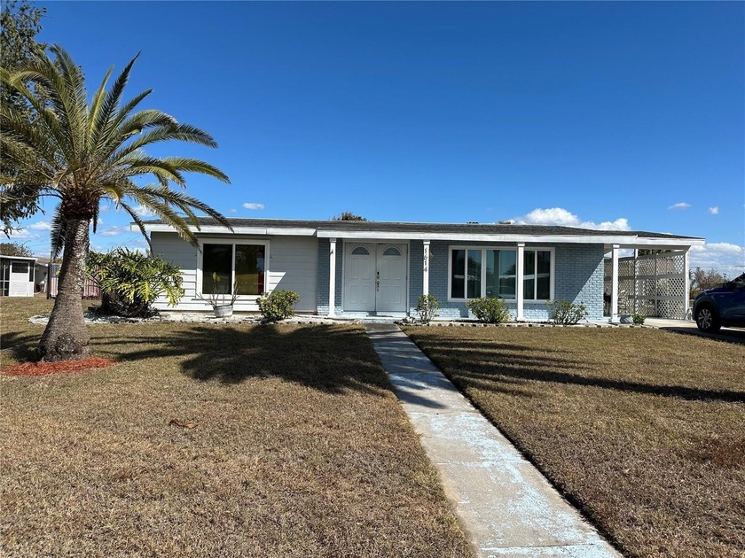 Discover comfort and updated efficiency in this charming - Beach Home for sale in Port Charlotte, Florida on Beachhouse.com