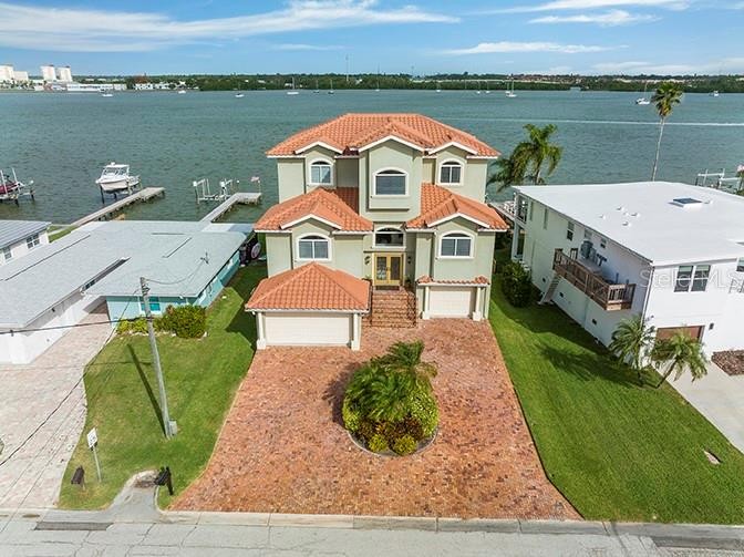 3-STORY LUXURY HOME WITH HUGE OPEN WATER VIEWS. Elevate your - Beach Home for sale in Madeira Beach, Florida on Beachhouse.com
