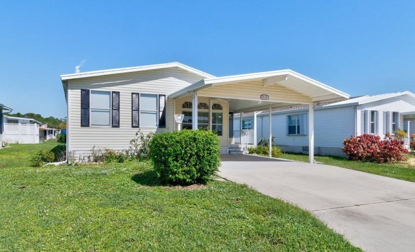 Don't miss this opportunity to own a super clean - Beach Home for sale in Barefoot Bay, Florida on Beachhouse.com