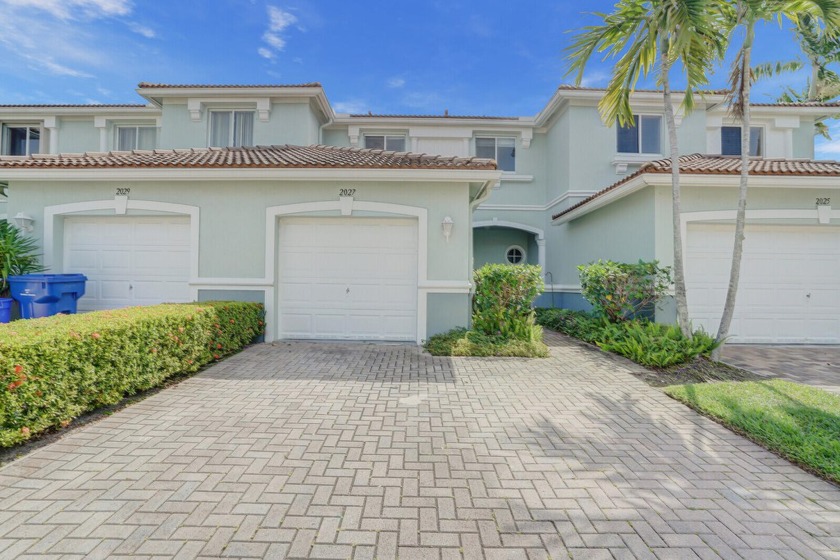 Welcome to your tranquil oasis with a serene pond view! Nestled - Beach Townhome/Townhouse for sale in Riviera Beach, Florida on Beachhouse.com