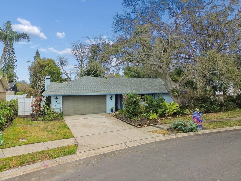 Welcome to 606 Grovewood Lane, nestled in the highly coveted The - Beach Home for sale in Largo, Florida on Beachhouse.com