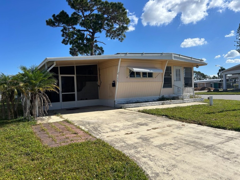 This furnished double wide home has laminate flooring, some - Beach Home for sale in Largo, Florida on Beachhouse.com