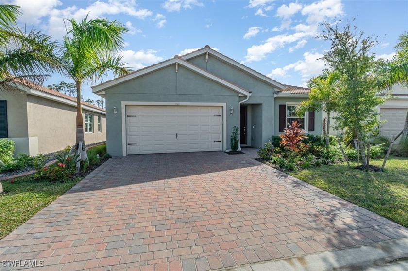 Gorgeous Nearly New Home with Impact Windows, offered Turnkey - Beach Home for sale in North Fort Myers, Florida on Beachhouse.com