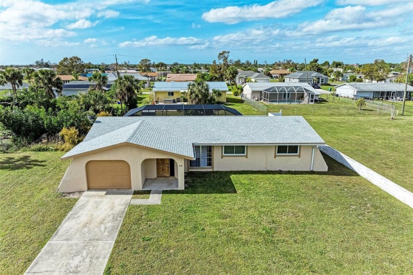 *TURNKEY* POOL home in the heart of Port Charlotte with lots of - Beach Home for sale in Port Charlotte, Florida on Beachhouse.com