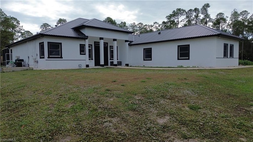 FOR SALE -- 570 31st St NW, Naples, FL 34120 
A Rare Naples - Beach Home for sale in Naples, Florida on Beachhouse.com