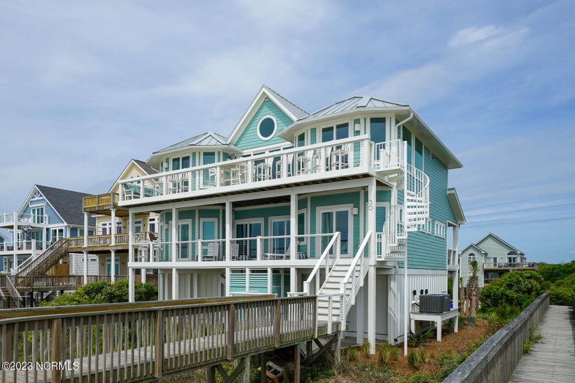 Nestled on the beautiful shores of North Topsail Beach, this - Beach Home for sale in North Topsail Beach, North Carolina on Beachhouse.com