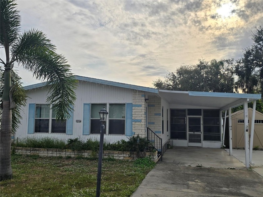 NO LOT RENT - Own Your Land! Welcome to easy Florida living in - Beach Home for sale in Ellenton, Florida on Beachhouse.com