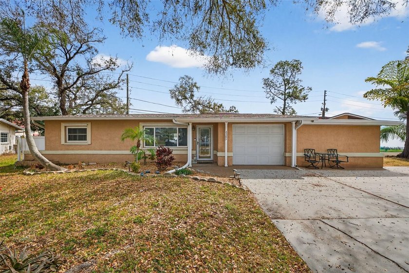 Nestled on a quiet, tree-lined street is this adorable 1960 - Beach Home for sale in Seminole, Florida on Beachhouse.com