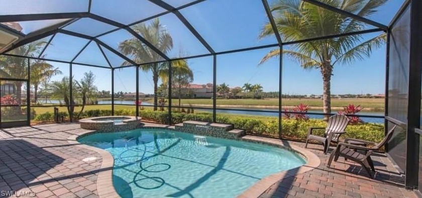 Surrounded by lush tropical landscaping and serene private lake - Beach Home for sale in Naples, Florida on Beachhouse.com