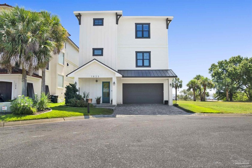 Stunning Craftsman-style home offering breathtaking views of - Beach Home for sale in Pensacola, Florida on Beachhouse.com
