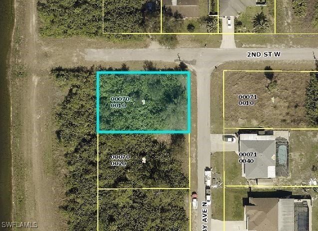 CORNER LOT- GREAT LOCATION. Lot next door for sale (103 Ruby Ave - Beach Lot for sale in Lehigh Acres, Florida on Beachhouse.com