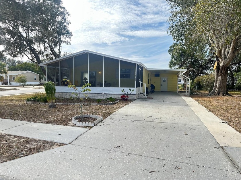 Immaculate 2BR/2BA manufactured home on a shaded corner lot in - Beach Home for sale in Hudson, Florida on Beachhouse.com