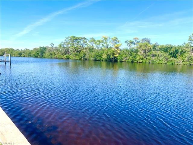 Located along the tranquil Imperial River, this charming 2 - Beach Lot for sale in Bonita Springs, Florida on Beachhouse.com