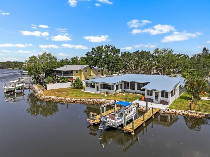 This WATERFRONT paradise is the perfect oasis for a - Beach Home for sale in Ruskin, Florida on Beachhouse.com