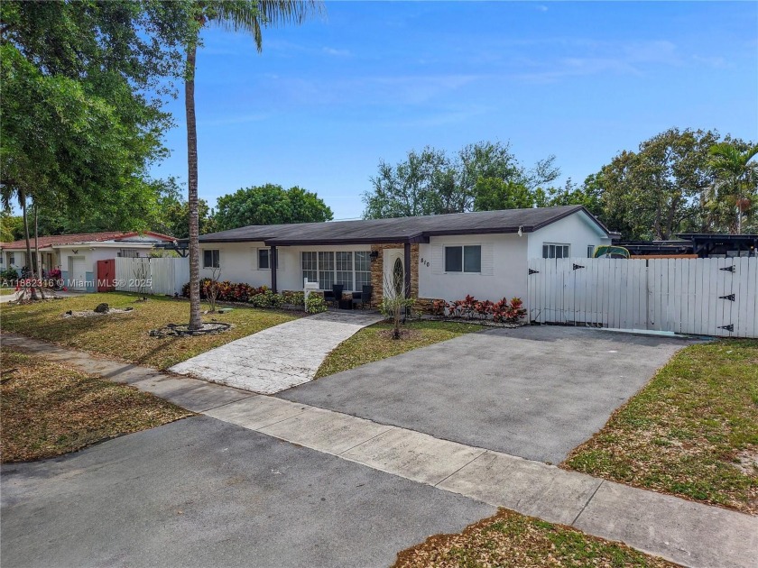 Nestled in the private community of Pickwick Lake Estates, this - Beach Home for sale in North Miami Beach, Florida on Beachhouse.com