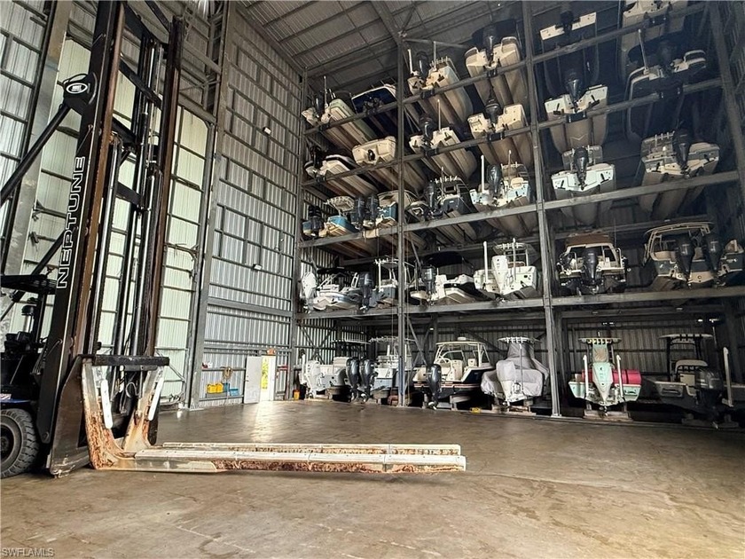 Concierge In/Out service. Large indoor dry boat storage condo on - Beach Condo for sale in Bonita Springs, Florida on Beachhouse.com