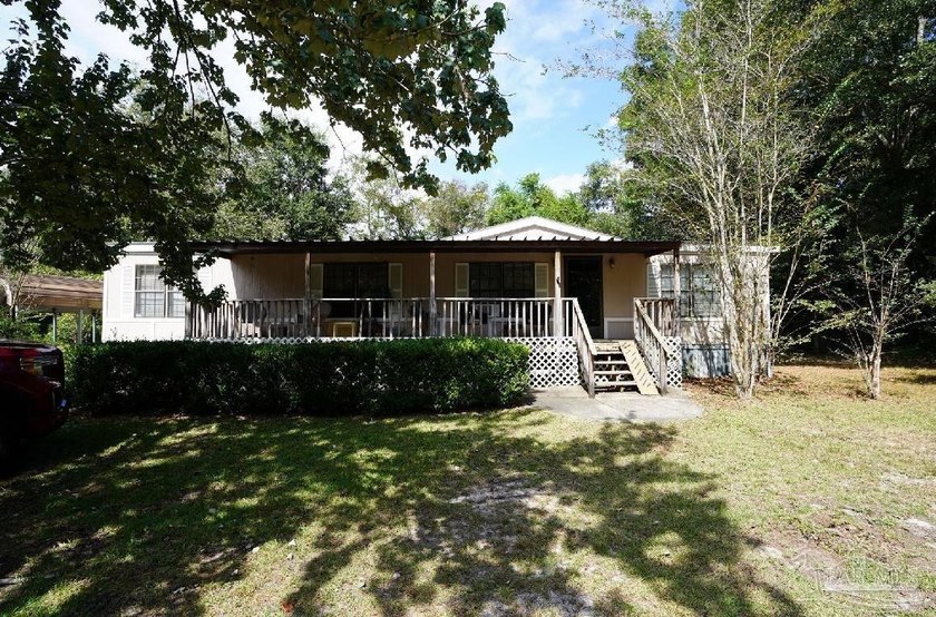 Location! Value! Potential!! 1.61 acres located in the heart of - Beach Home for sale in Pace, Florida on Beachhouse.com