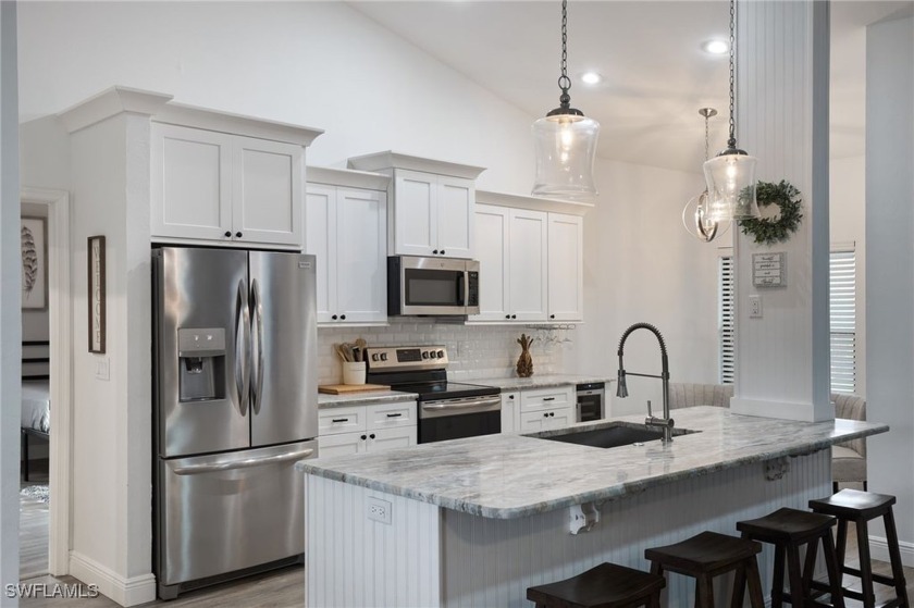 This great room floor plan home with designer upgrades - Beach Home for sale in Estero, Florida on Beachhouse.com