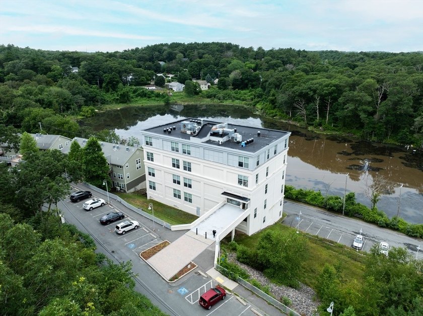 This thoughtfully designed, top floor, single level unit offers - Beach Condo for sale in Gloucester, Massachusetts on Beachhouse.com