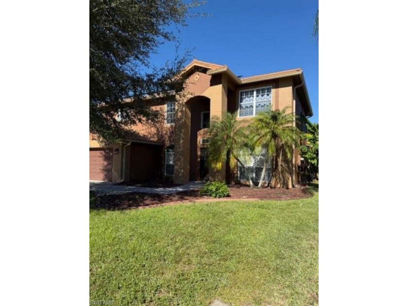 This breathtaking Lakefront, Two Story Home with Luxury Vinyl - Beach Home for sale in Fort Myers, Florida on Beachhouse.com