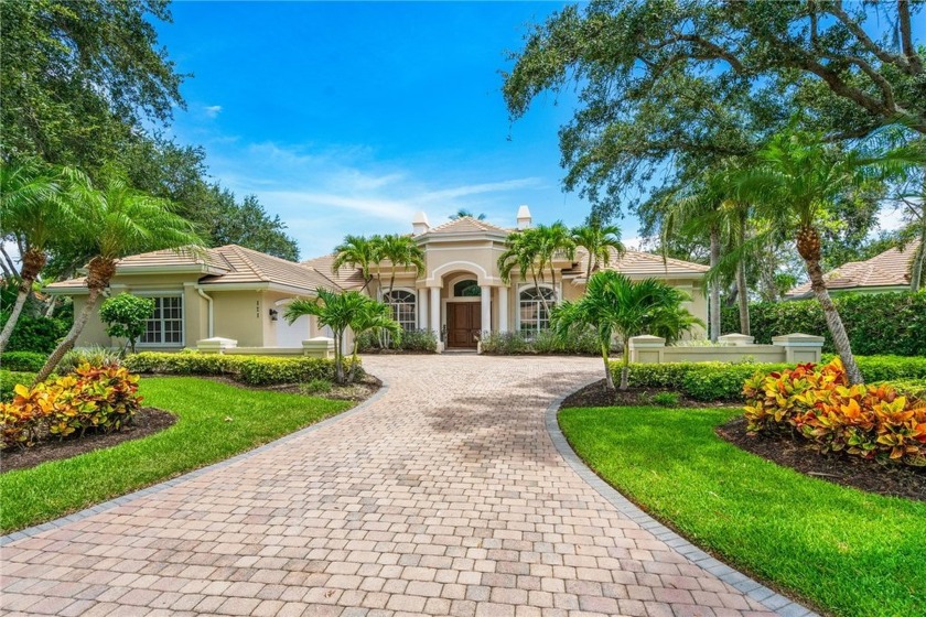 Stunning Shores residence!  CBS 4 BD/4BA lakefront home with all - Beach Home for sale in Vero Beach, Florida on Beachhouse.com