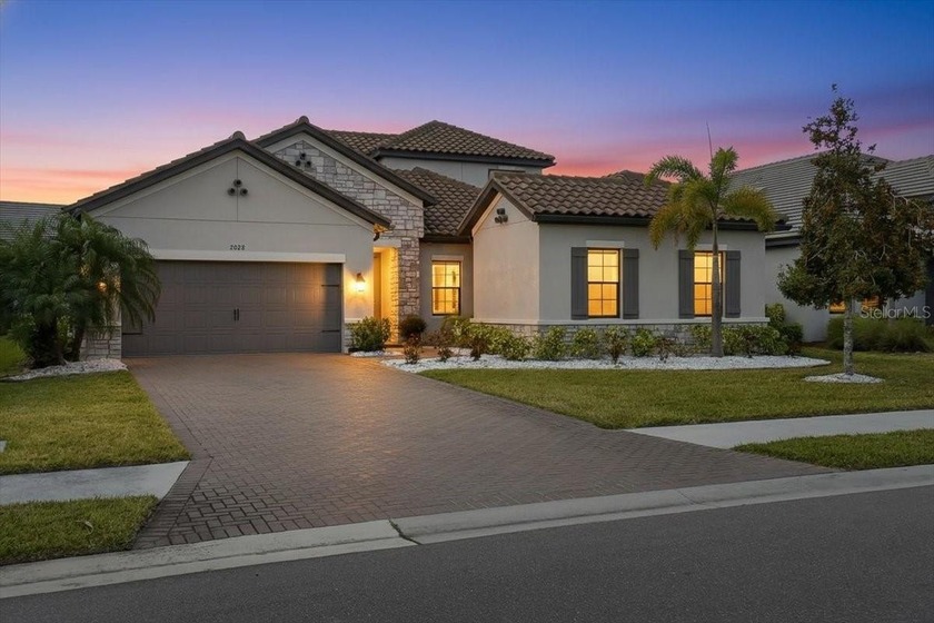 Incredible Lakewood Ranch pool home with a private attached - Beach Home for sale in Bradenton, Florida on Beachhouse.com