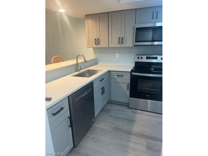 Welcome to your beautifully updated 3-bedroom, 2-bathroom - Beach Condo for sale in Bonita Springs, Florida on Beachhouse.com