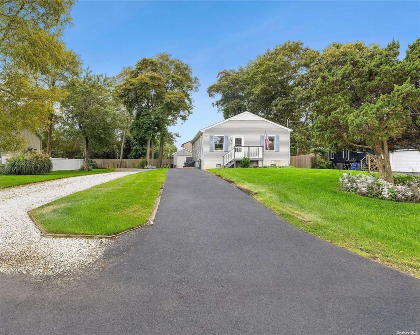 Welcome to this charming 3-bedroom, 1.5-bath ranch home. With - Beach Home for sale in Mastic Beach, New York on Beachhouse.com