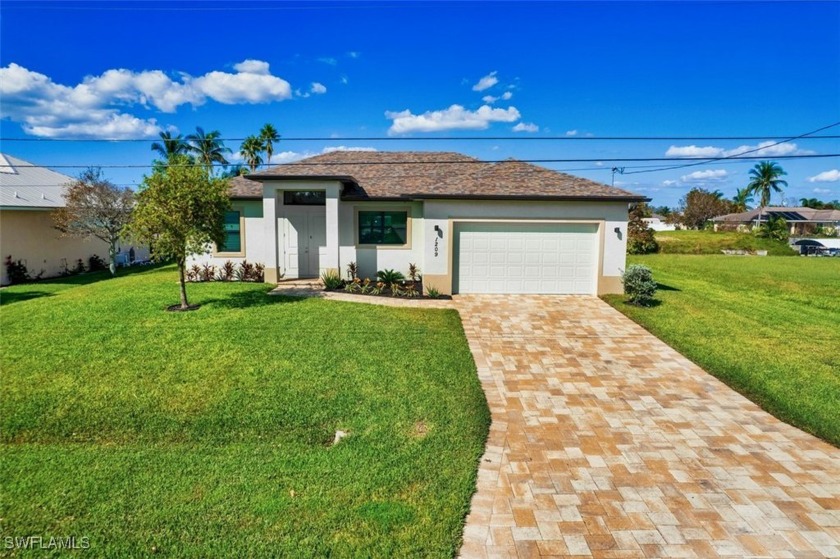 This impressive 3-bedroom, 2-bath home, built in 2020, is a - Beach Home for sale in Cape Coral, Florida on Beachhouse.com