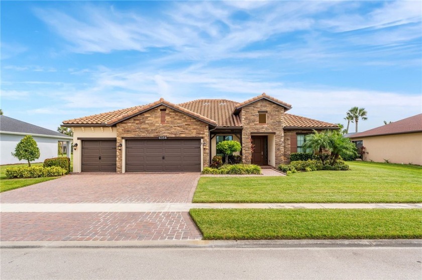 Exquisite home in coveted Arcadia gated community. Impact wdw - Beach Home for sale in Vero Beach, Florida on Beachhouse.com